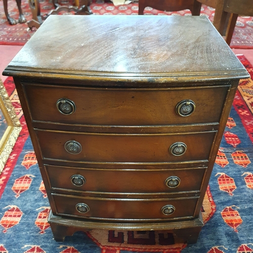 174 - A reproduction Mahogany and veneered miniature Chest of Drawers. 45 x 35 x H 59 cm approx.