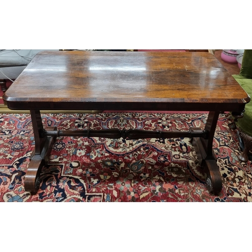 216 - An early to mid 19th Century Rosewood and veneered Library Table with stretcher base. 117 x 60 x H 7... 