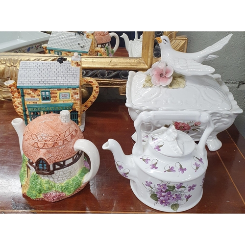 125 - A 19th Century Spode Centre Dish along with decorative tea Pots, a blue ground Vase and four Kellcra... 