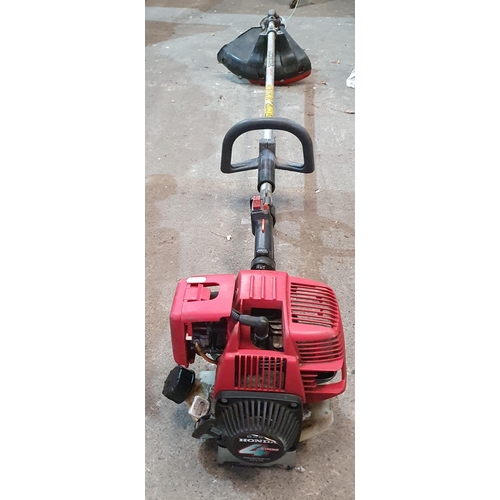 4 - A good Honda petrol driven Strimmer.