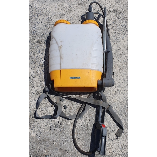 8 - A large knapsack Sprayer along with another smaller one.