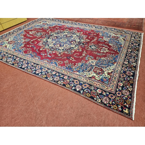 445 - A rich Red and Blue ground Persian Najah Bad Carpet from the Isfahan region of Iran. 370 x 270 cm ap... 