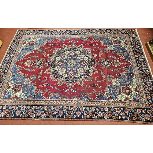 445 - A rich Red and Blue ground Persian Najah Bad Carpet from the Isfahan region of Iran. 370 x 270 cm ap... 