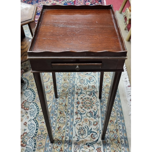 493 - A 20th Century Mahogany Lamp Table with gallery top and brushing slide on square tapered supports. 3... 