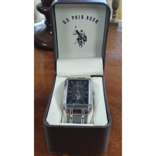 529 - A US Polo Assn Men's Black dial Watch in its original Box.