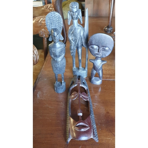 180 - A pair of 19th Century Silver plated Tureens along with a group of African Plaques and a Lamp.