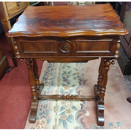 183 - A 19th Century Mahogany work Table on turned reeded supports and stretcher base. 53 x 38 cm approx.