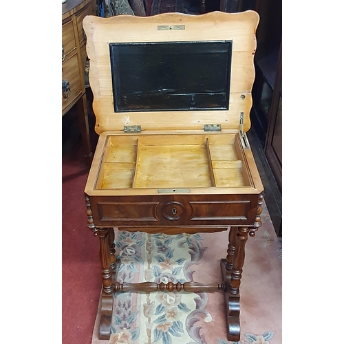 183 - A 19th Century Mahogany work Table on turned reeded supports and stretcher base. 53 x 38 cm approx.