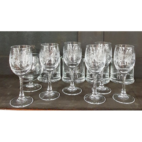 204 - A good quantity of Crystal and Glass to include port glasses, centre dishes on one shelf.