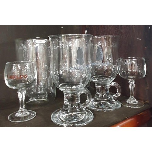 204 - A good quantity of Crystal and Glass to include port glasses, centre dishes on one shelf.