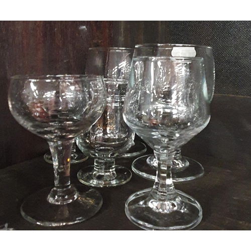 204 - A good quantity of Crystal and Glass to include port glasses, centre dishes on one shelf.