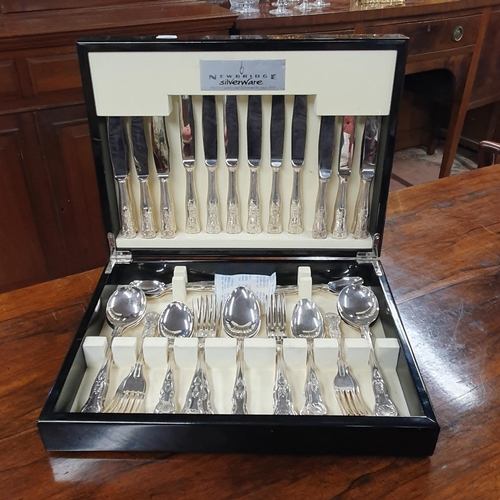 215 - A cased set of Newbridge Cutlery.