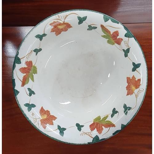 226 - A Stoneware centre Bowl along with a Wemyss style example. D 40 , D 32 cm approx.