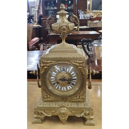 261 - A good 19th Century Brass mantel Clock by Richond. Richond (1795-1873) was a clockmaker and jeweller... 