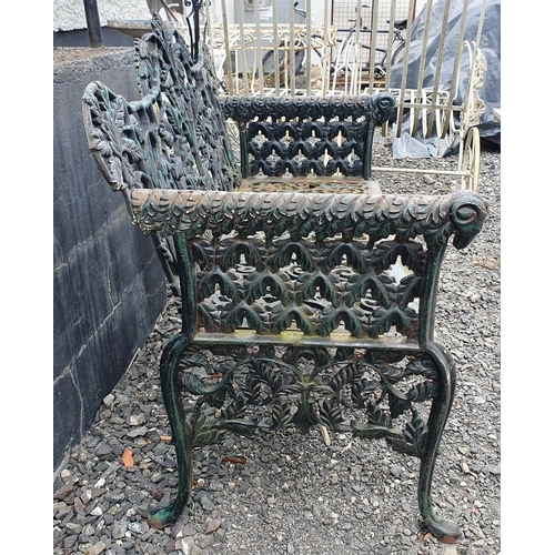 29 - A good Cast Iron garden Bench with Oak leaf decoration and Rams head arms.
H 88 x W 104 x D 60 cm ap... 