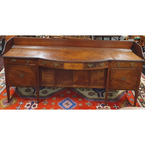 450 - A good Georgian Mahogany and inlaid bow fronted Sideboard with Ebony Greek key detail on square tape... 