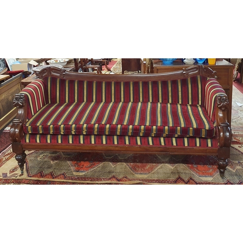 468 - Almost matching to lot  794; A William IV Mahogany show frame Couch with carved outline on turned ca... 