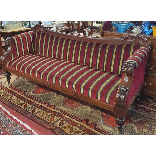 468 - Almost matching to lot  794; A William IV Mahogany show frame Couch with carved outline on turned ca... 