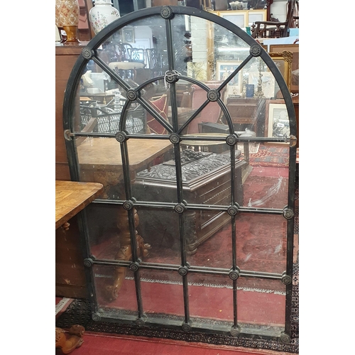 476 - A Metal arch topped Mirror. W 92 x H 134 cm approx.