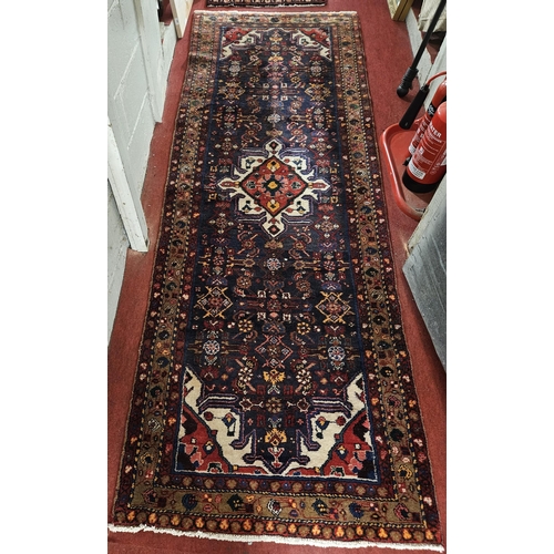 500 - A good Persian Runner. 295 x 105cm approx.