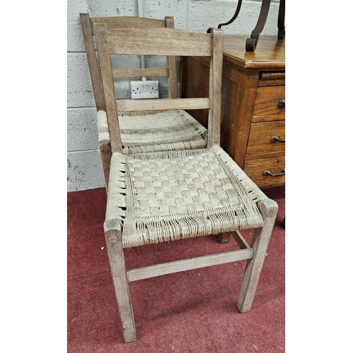 704 - A good pair of rustic Chairs with rush seats. W 44 x SH 45 x BH 83 cm approx.