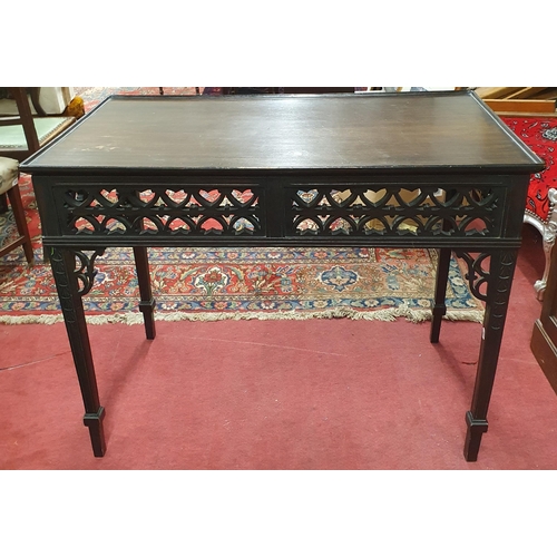 707 - A late 19th Century - early 20th Century Mahogany side Table with pierced freeze and tray top. 97 x ... 