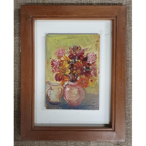 731 - A 20th Century Oil On Board Still Life of flowers in a vase. 18 x 12 cm approx.