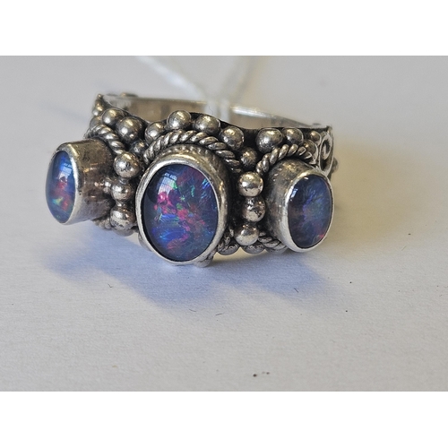 624 - A Silver Opal three stone Ring, size M.