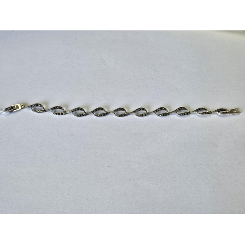 627 - A Silver and Marcasite Bracelet.