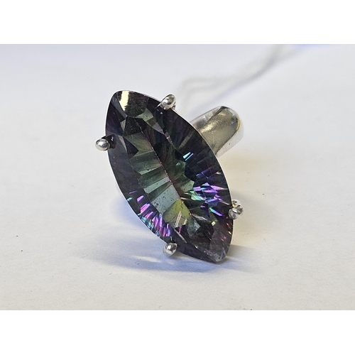 635 - A Silver and Mystic Topaz Ring, size J.