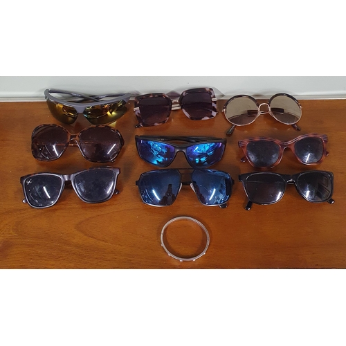 879 - A collection of Sunglasses.