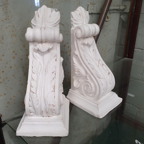 69 - A good pair of Plaster Corbels. H 32 cm approx