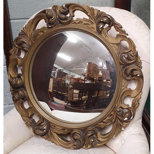 71 - A good Plaster Gilt Mirror with pierced outline and convex glass. D 50 cm approx.