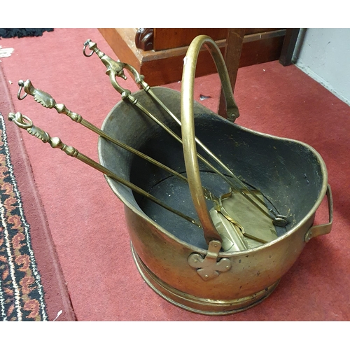 125 - A 19h Century Brass Coal Bucket along with a companion set.