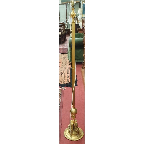 128 - A very heavy Brass and Metal Standard Lamp.