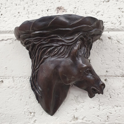 131 - A wall Bracket in the form of a horses Head. H 21 cm approx.