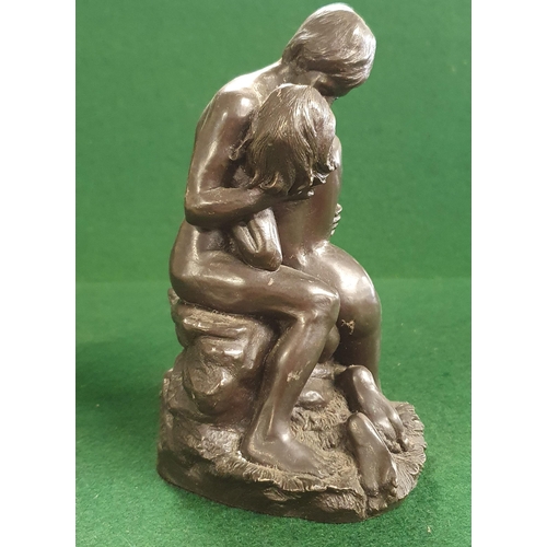 145 - A Bronzed Figural group of a loving couple. H 15 cm approx.