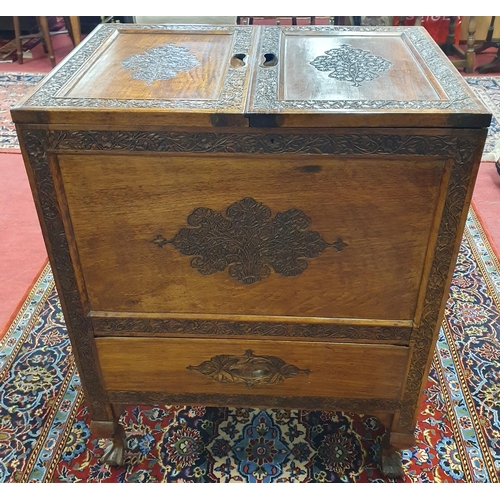 168 - A good Rosewood Drinks Cabinet with fitted interior and highly carved outline. 61 x 43 x H 77 cm app... 