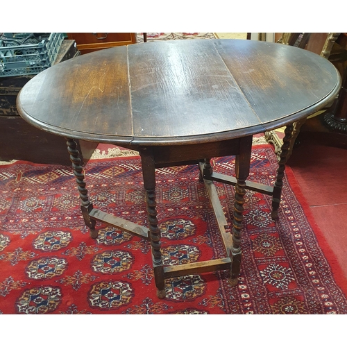 170 - An early 20th Century Oak gateleg Table on barley twist supports. 76 x 106 x H 72 cm approx.