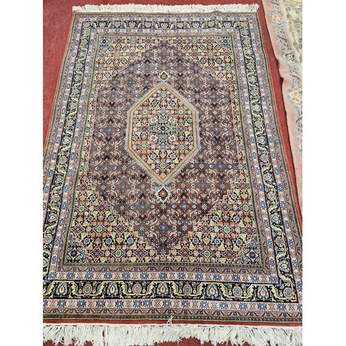 234 - A fantastic Red and Pink ground Carpet with unique central medallion design and multi borders. 250 x... 