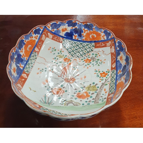 278 - A good early Oriental hand painted Bowl along with a small Charger. D 23.5 x H 10, D 30 cm approx.