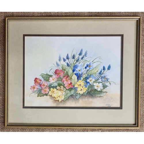 592 - A 20th Century Watercolour of a spring scene with primroses by E J Jackson. Signed LR. 20 x 28 cm ap... 