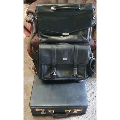 810 - A Group of three Vintage Leather Brief case and satchels.