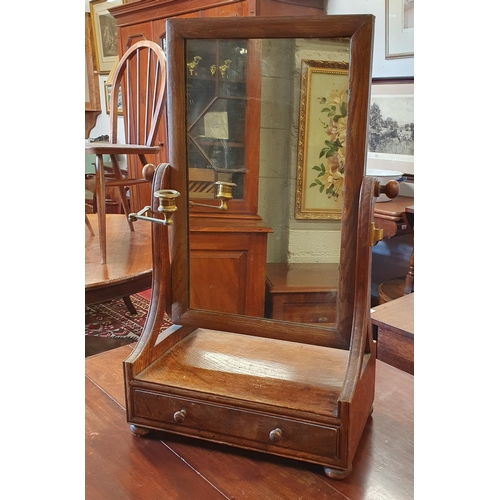 825 - An early 19th Century Oak Crutch Mirror with candle support and single frieze drawer. W 42 x 23 x H ... 