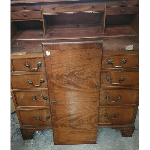 842 - A 19th Century Mahogany Bureau with flame grain fall flap and a fitted interior.