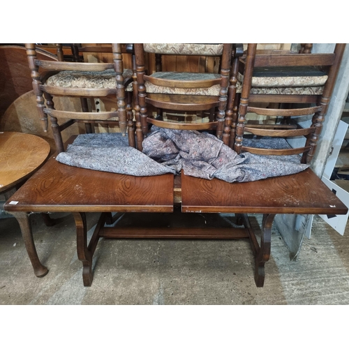 844 - An early 20th Century Oak kitchen Table and Chairs by Younger. H 74 x W 92 x L 157 (without extendab... 