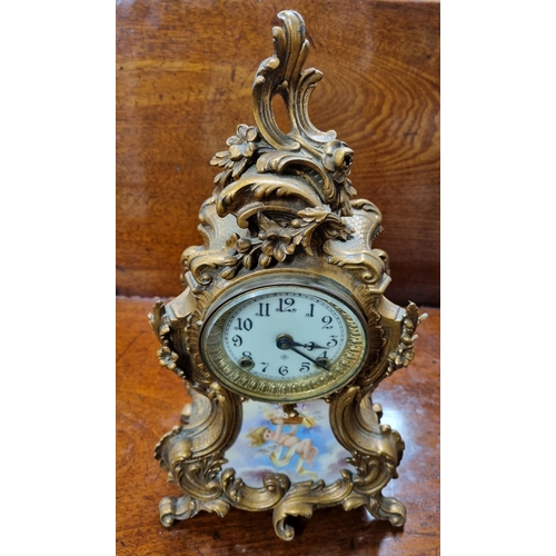 857 - A good Continental Mantel Clock with Sevres style panel base. H 37 cm approx.