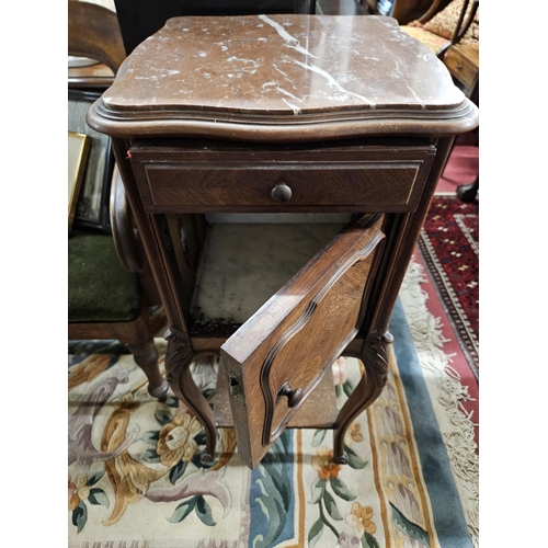 654 - Of Fabulous quality. A 19th Century Rosewood and veneered marble topped side Cabinet on carved suppo... 