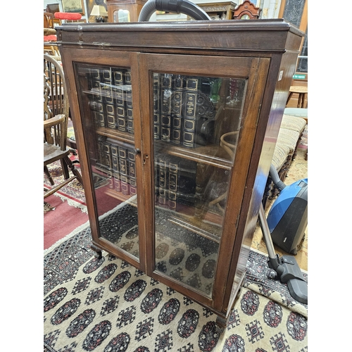 659 - An Edwardian Mahogany two door glazed side Cabinet. H 114 x W 79 x D 34 cm approx.