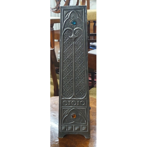 662 - A Liberty style early 20th Century obelisk shaped vase in the Arts and Crafts design. 
H 42 cm appro... 